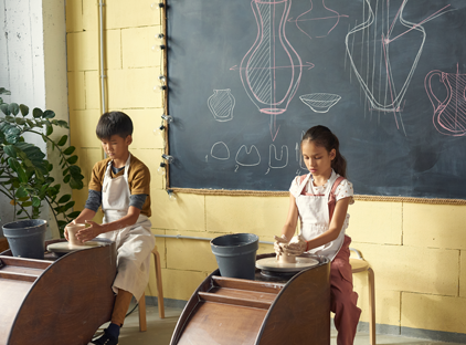 7fafae12 row of three intercultural schoolkids making potte 2025 03 18 07 40 04 utc copy