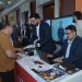 Extramarks team talking to a visitor at the Extramarks booth, Eduthon 6.0, Chandigarh